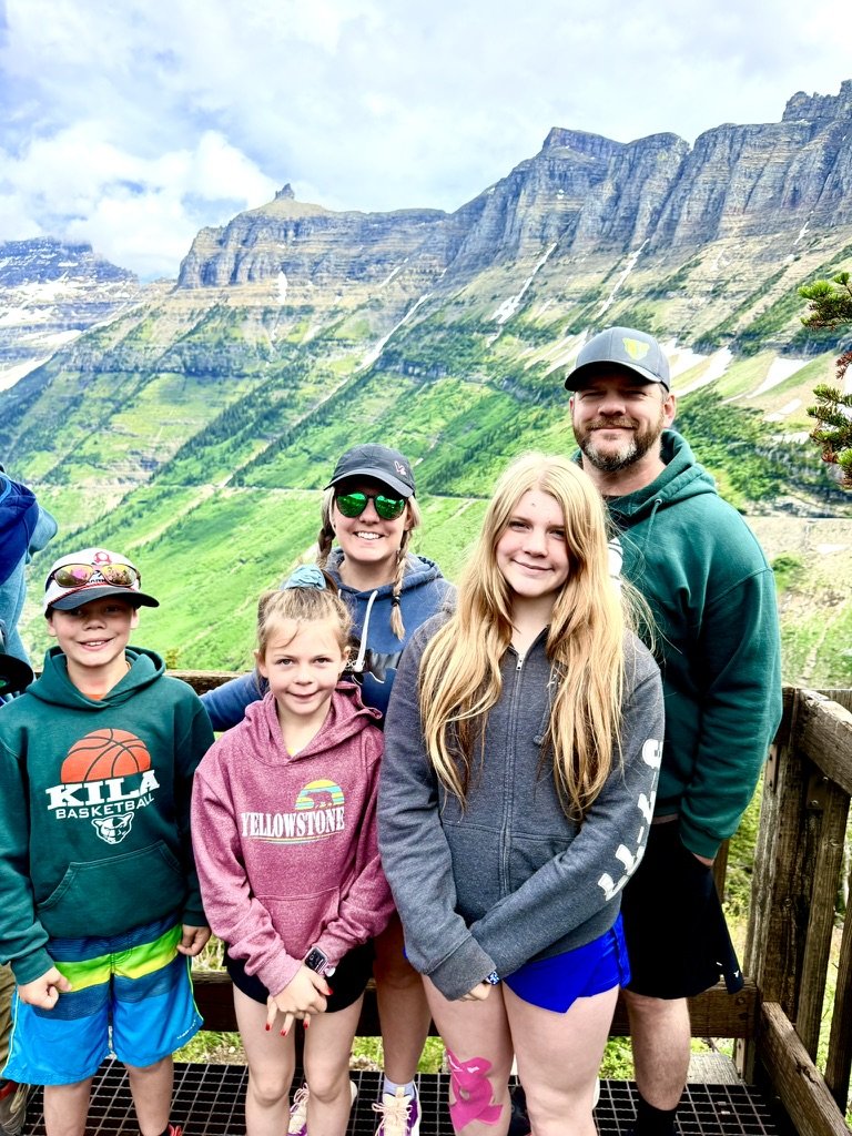 The Silvius family, owners of Silco Plumbing, at Glacier National Park